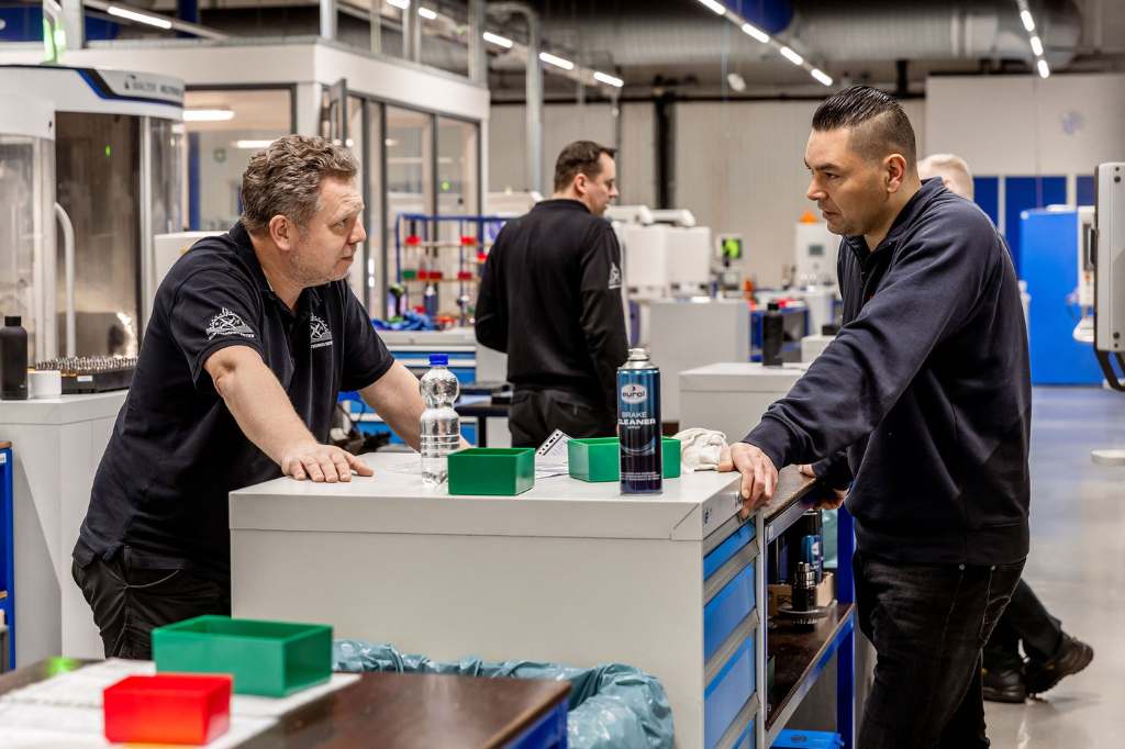 Overleg over het netwerk in de werkplaats