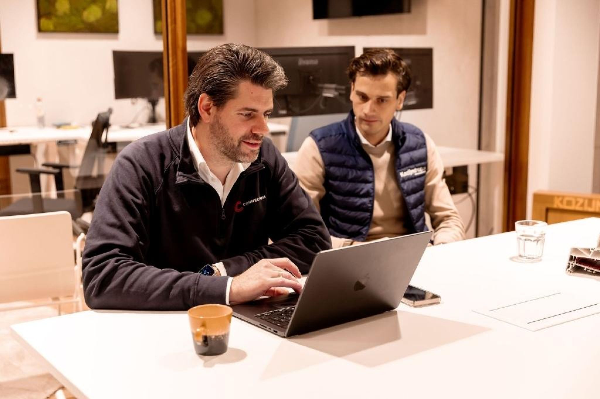 Overleg tussen Connectium en Kozijnshop