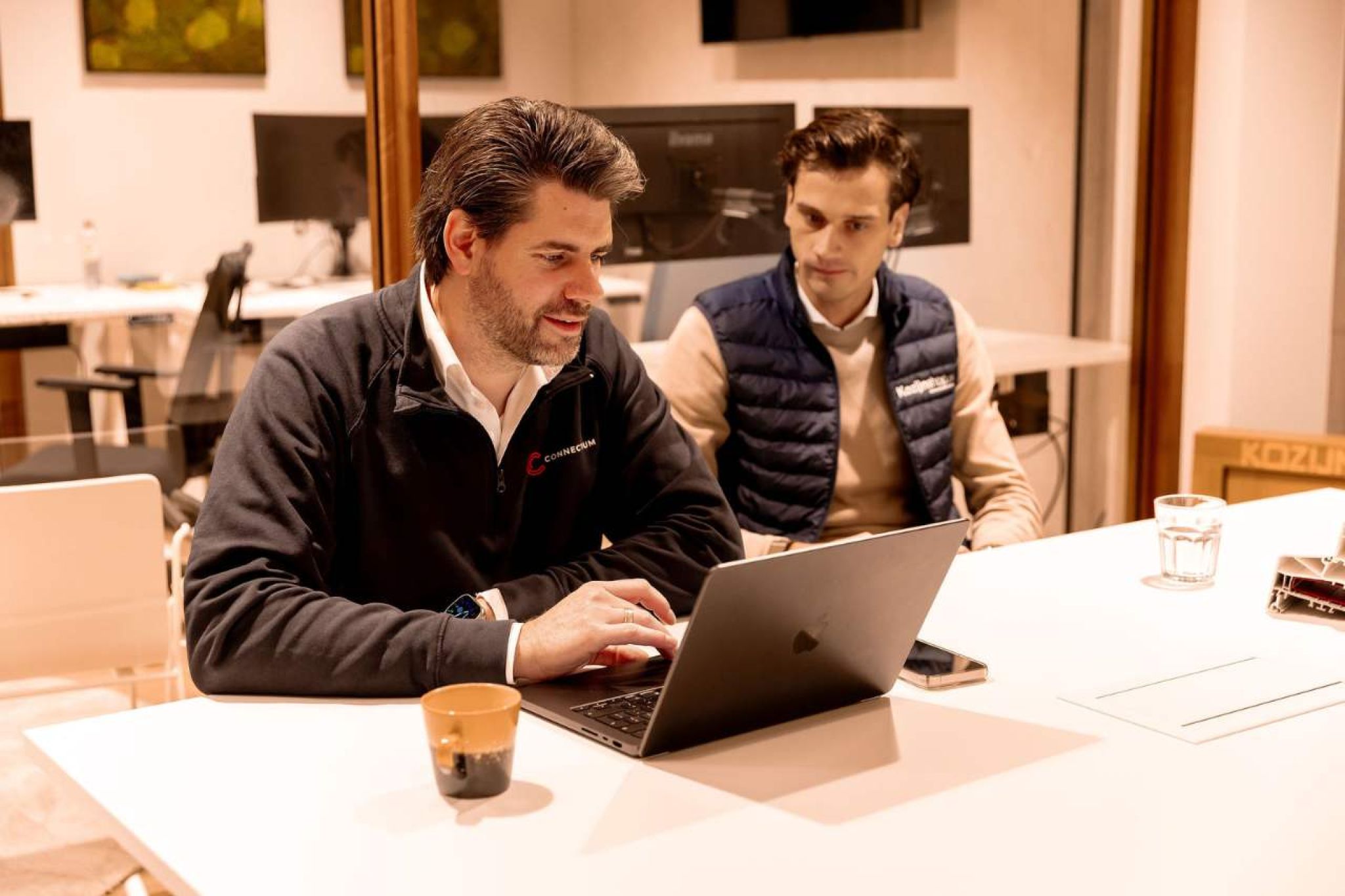 Overleg tussen Connectium en Kozijnshop